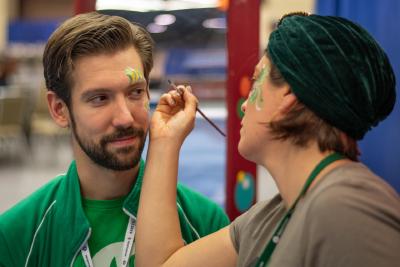 Me having my face painted by the Four Kitchens Operations Director